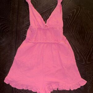 Lush Pink Sleeveless V-Neck Romper with Ruffle Hem